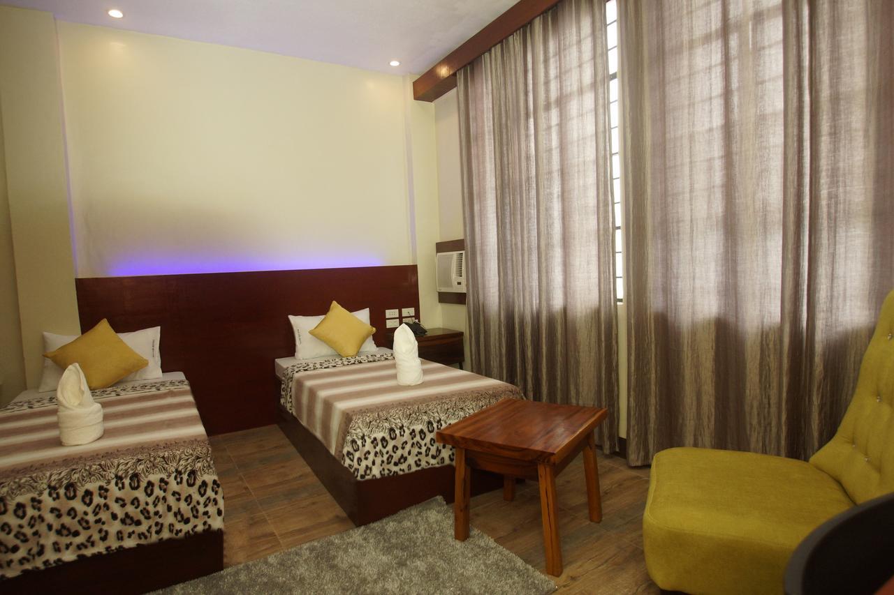 Hacasi Hotel Anibong Luaran gambar